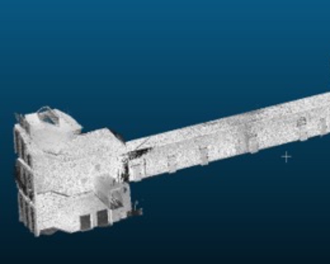 Detail of the campus point cloud — one scanned building wing on a blue gradient